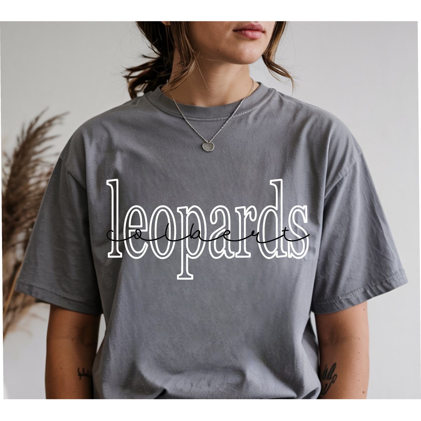 Colbert Script with Leopards Outline