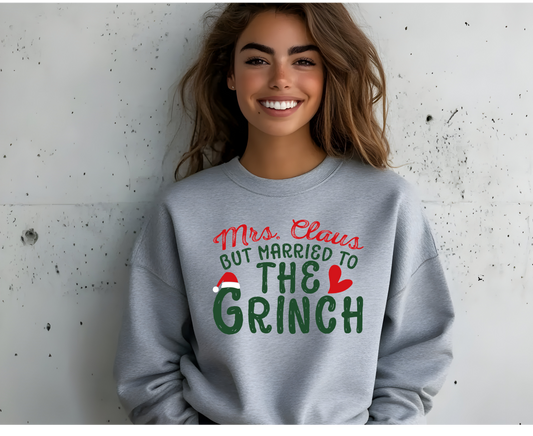 Mrs. Claus married to the Grinch